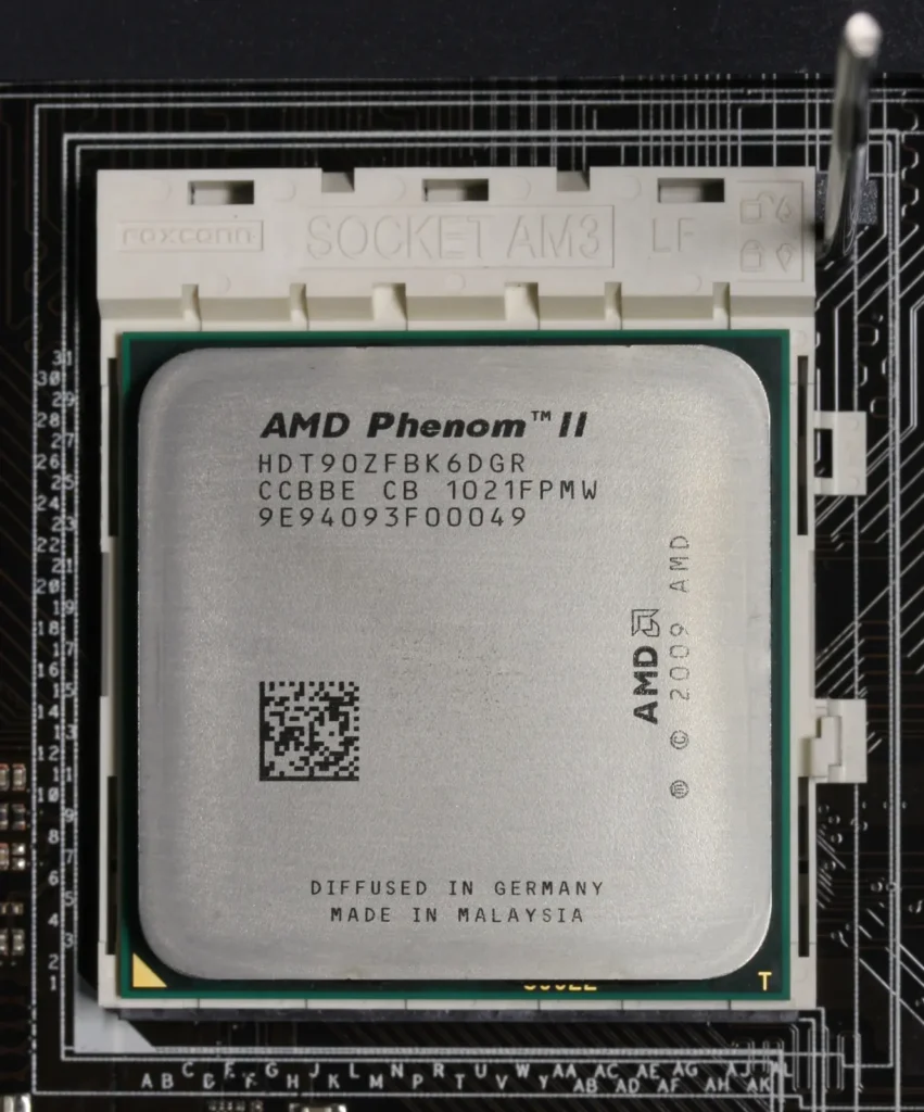 A CPU placed into an open motherboard socket, ready for the retention lever to be closed